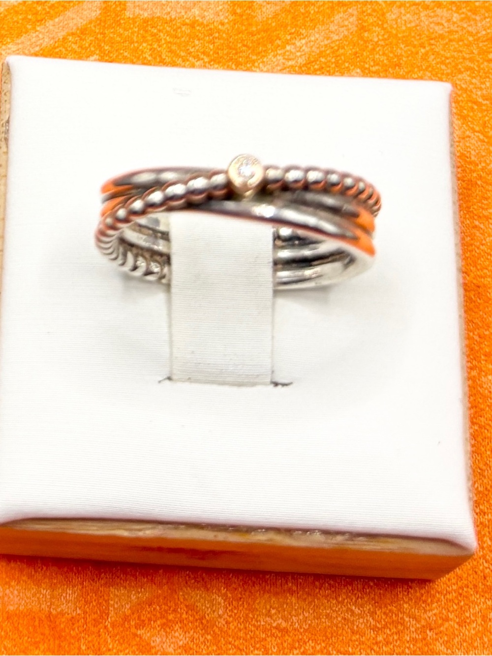 Sterling Silver Stackable Beaded and Twisted Ring with a diamond set in gold